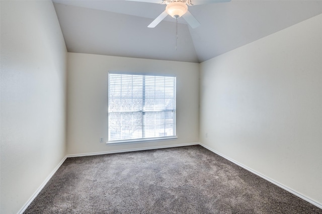 carpeted empty room with ceiling fan and vaulted ceiling