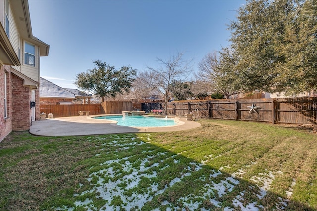 view of yard with a fenced in pool and a patio