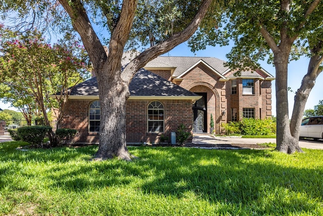 view of front of home with a front yard