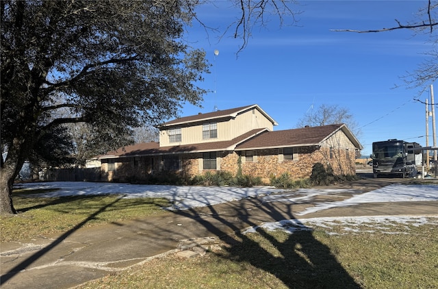 view of front of property with a front lawn