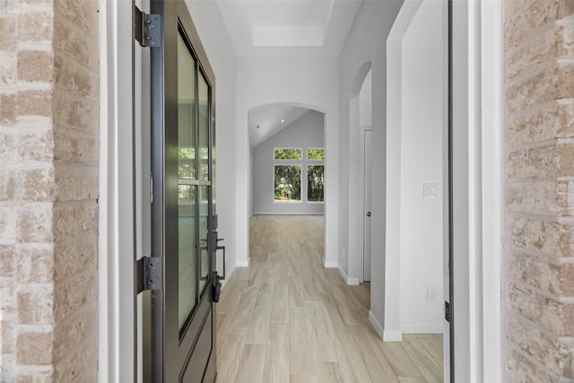 hallway featuring light wood-type flooring