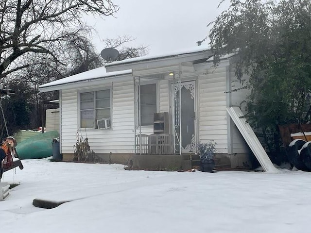 view of front of home featuring cooling unit