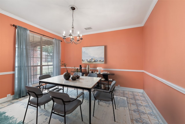 dining area with ornamental molding and a chandelier