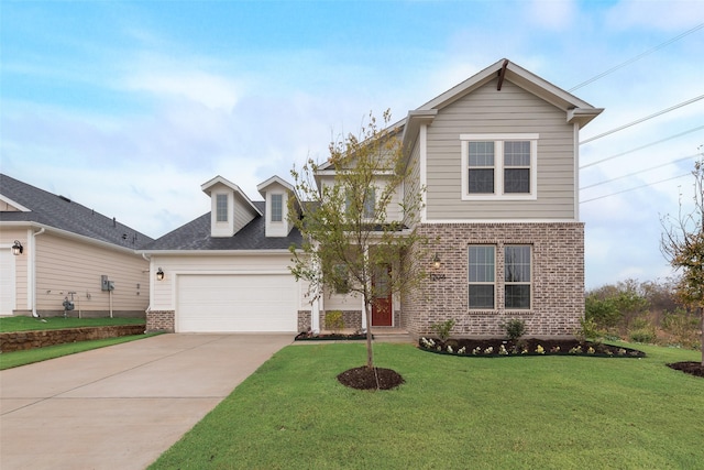 view of front of house featuring a front yard and a garage