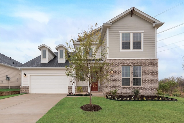 view of front property featuring a front lawn and a garage