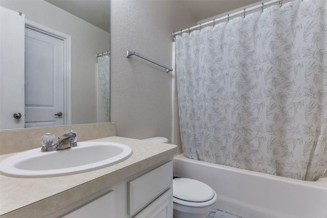 full bathroom featuring vanity, toilet, and shower / tub combo