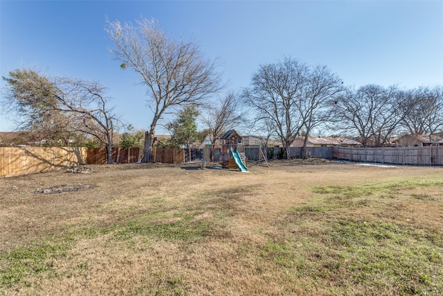 view of yard with a playground