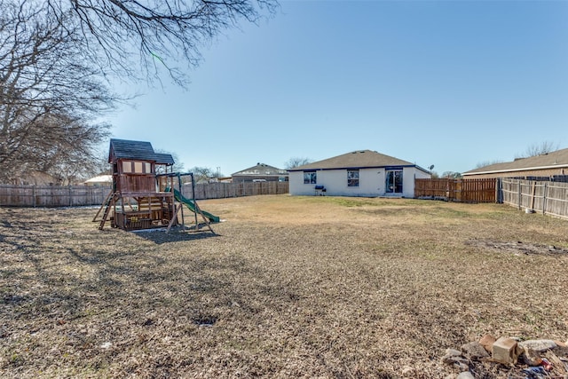 view of yard with a playground