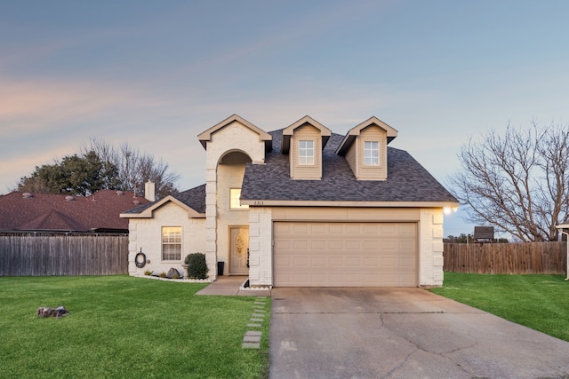 view of front of home featuring a lawn