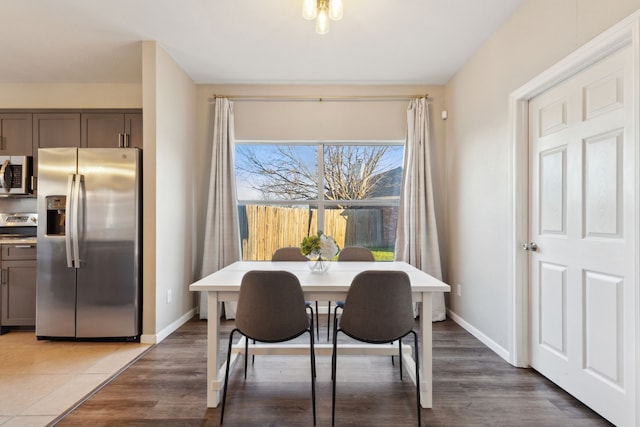 dining area featuring hardwood / wood-style floors