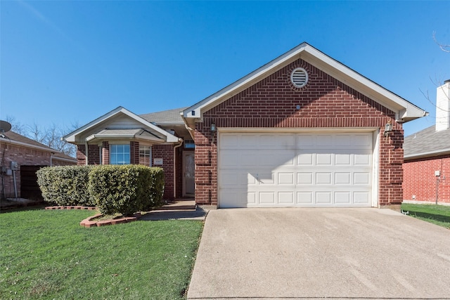 view of front of house featuring a garage and a front yard