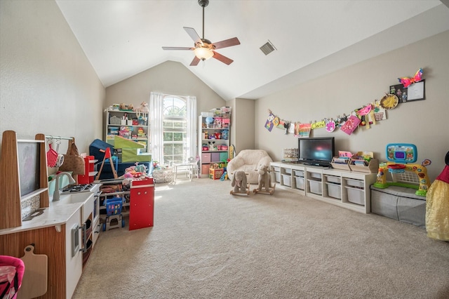 playroom featuring carpet, ceiling fan, and lofted ceiling