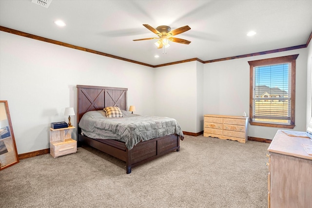 bedroom with ceiling fan, light colored carpet, and ornamental molding