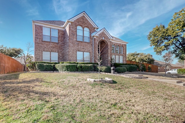 front facade with a front yard