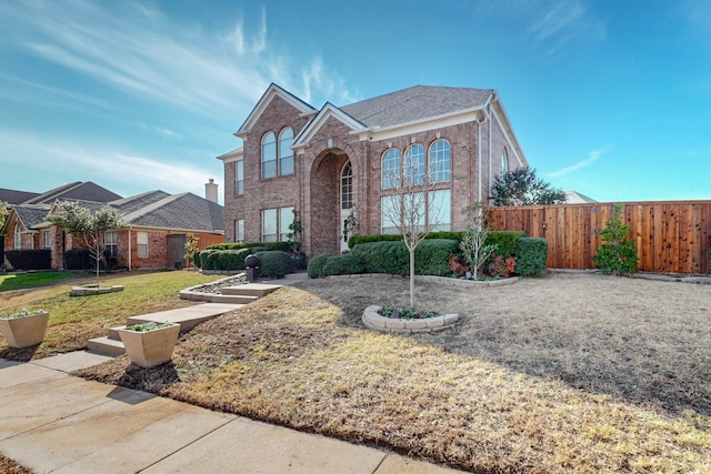 view of property with a front lawn