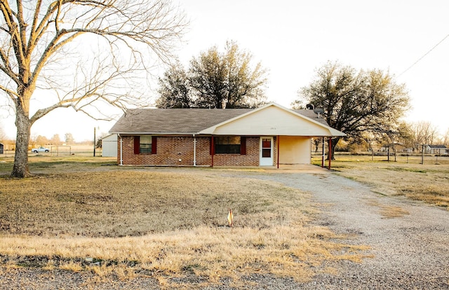 view of front facade featuring a carport