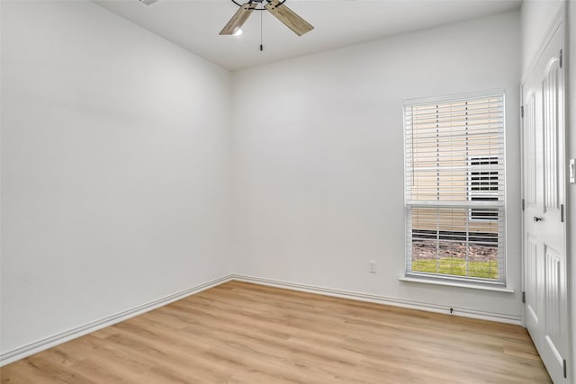 unfurnished room with light hardwood / wood-style floors and ceiling fan