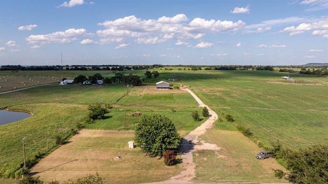 birds eye view of property featuring a rural view