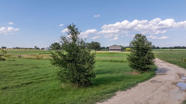 exterior space with a rural view