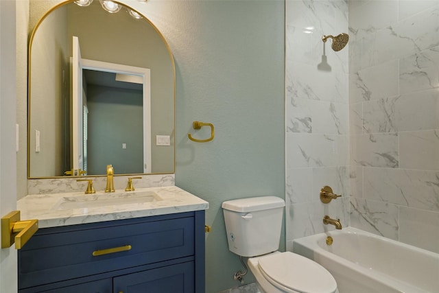 full bathroom with vanity, toilet, and tiled shower / bath combo