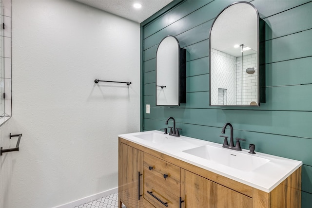 bathroom featuring tile patterned floors and vanity