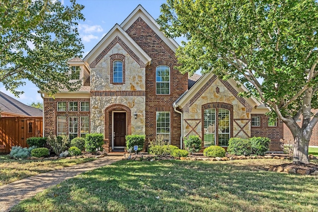 view of front of home featuring a front lawn