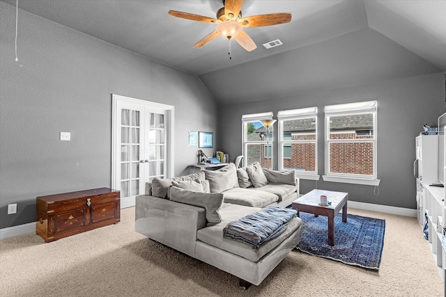 living room featuring carpet, french doors, ceiling fan, and lofted ceiling