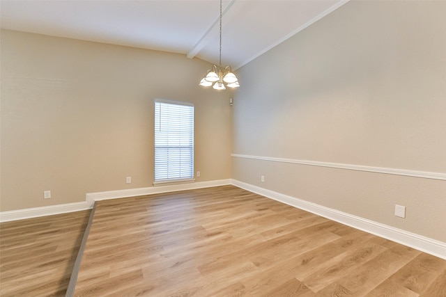 unfurnished room with hardwood / wood-style floors, vaulted ceiling with beams, and an inviting chandelier