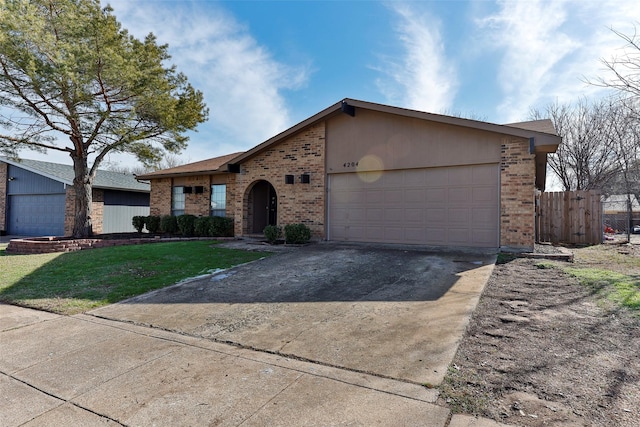 single story home with a front lawn and a garage