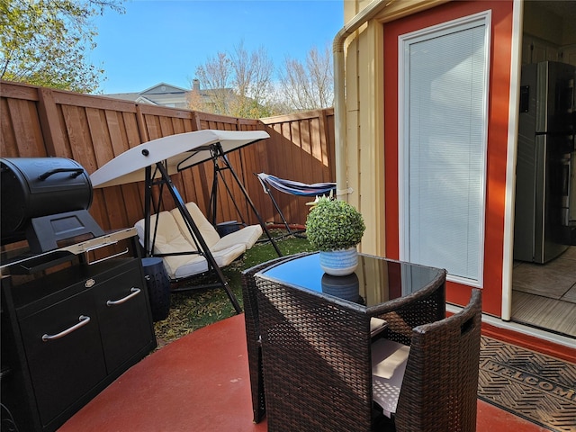 balcony featuring a patio area