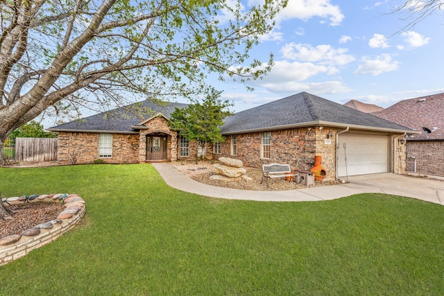 ranch-style house featuring a front lawn and a garage