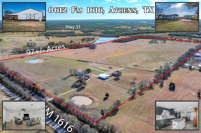 birds eye view of property featuring a rural view