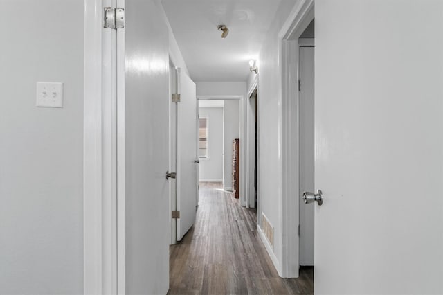 hall featuring dark hardwood / wood-style floors