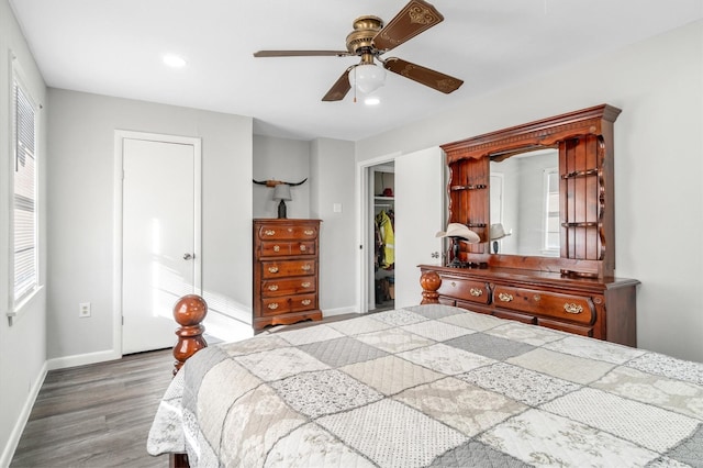 bedroom featuring ceiling fan and wood-type flooring