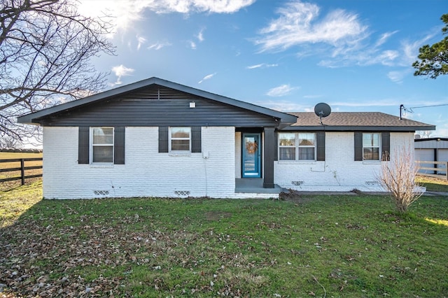 single story home with a front yard