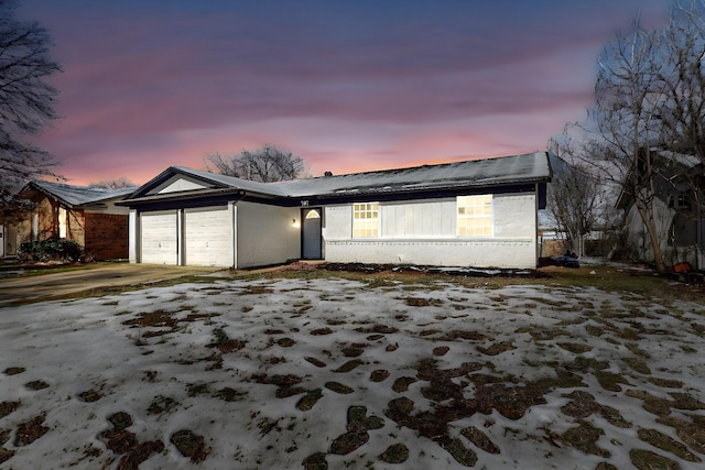 view of front of home featuring a garage