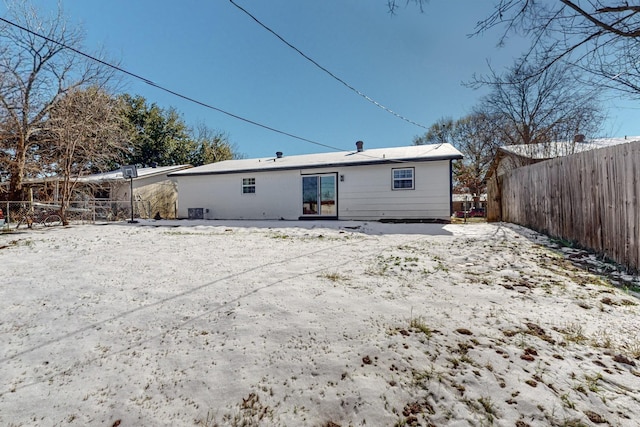 view of snow covered house