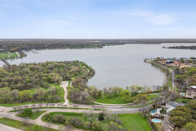 drone / aerial view with a water view