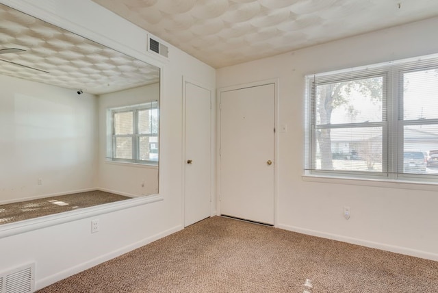 view of carpeted entryway