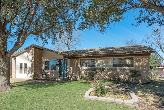 ranch-style house with a front yard