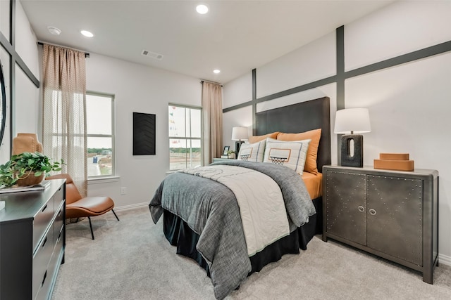 bedroom featuring light carpet