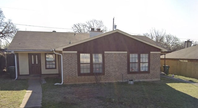 view of front of home with a front yard