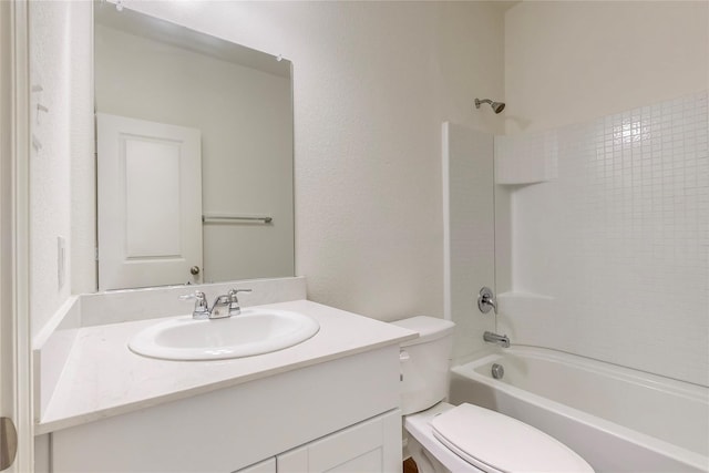 full bathroom with vanity,  shower combination, and toilet