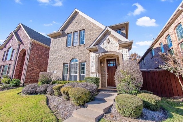 view of front of property with a front lawn