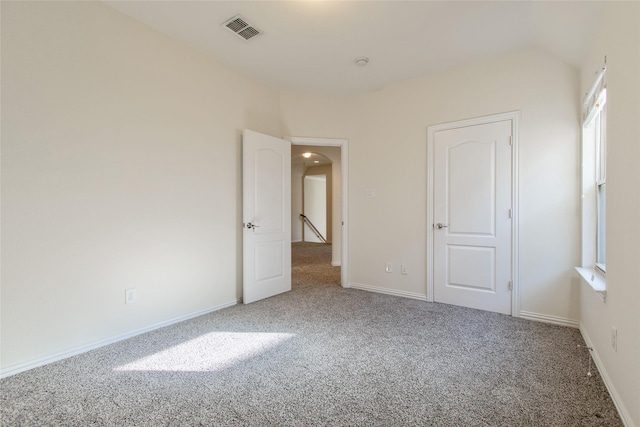 unfurnished bedroom featuring carpet flooring