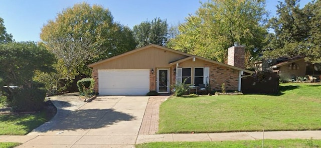 ranch-style house featuring a garage and a front yard