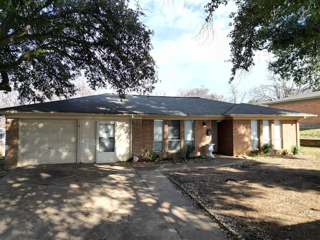 ranch-style home with a garage