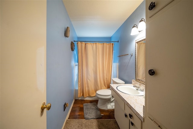 full bathroom featuring vanity, toilet, and shower / tub combo with curtain