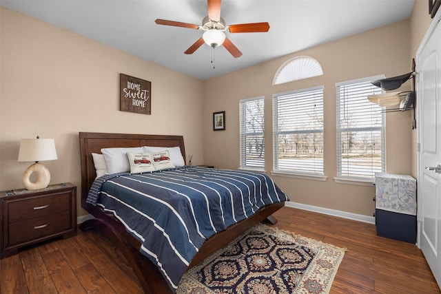 bedroom featuring ceiling fan and dark hardwood / wood-style floors