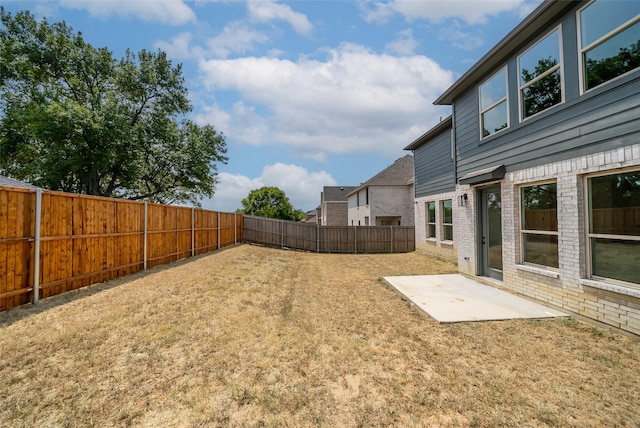 view of yard with a patio area